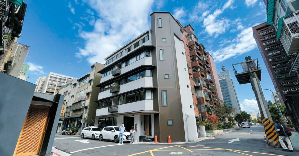 ▲大安區四維路老公寓在外牆拉皮與增設電梯後，街廓呈現嶄新風貌。（圖／王瑞婷提供）